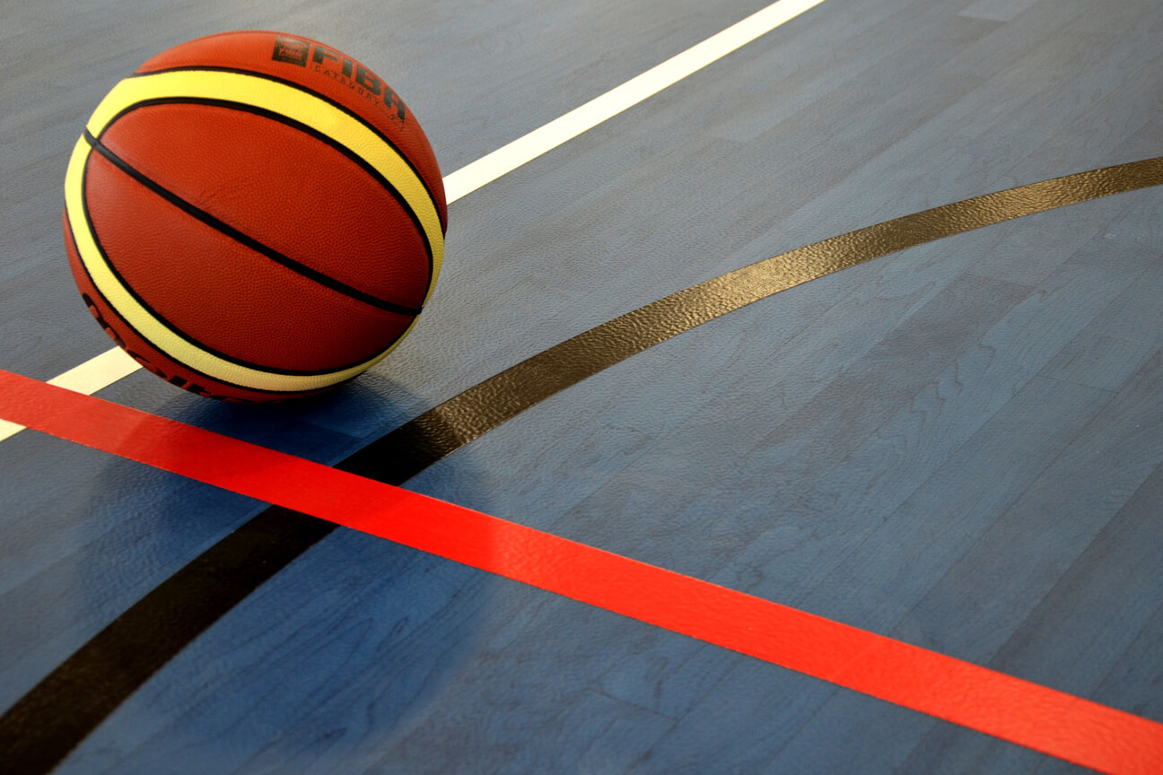 Basketball and game lines on Omnisports sports floor