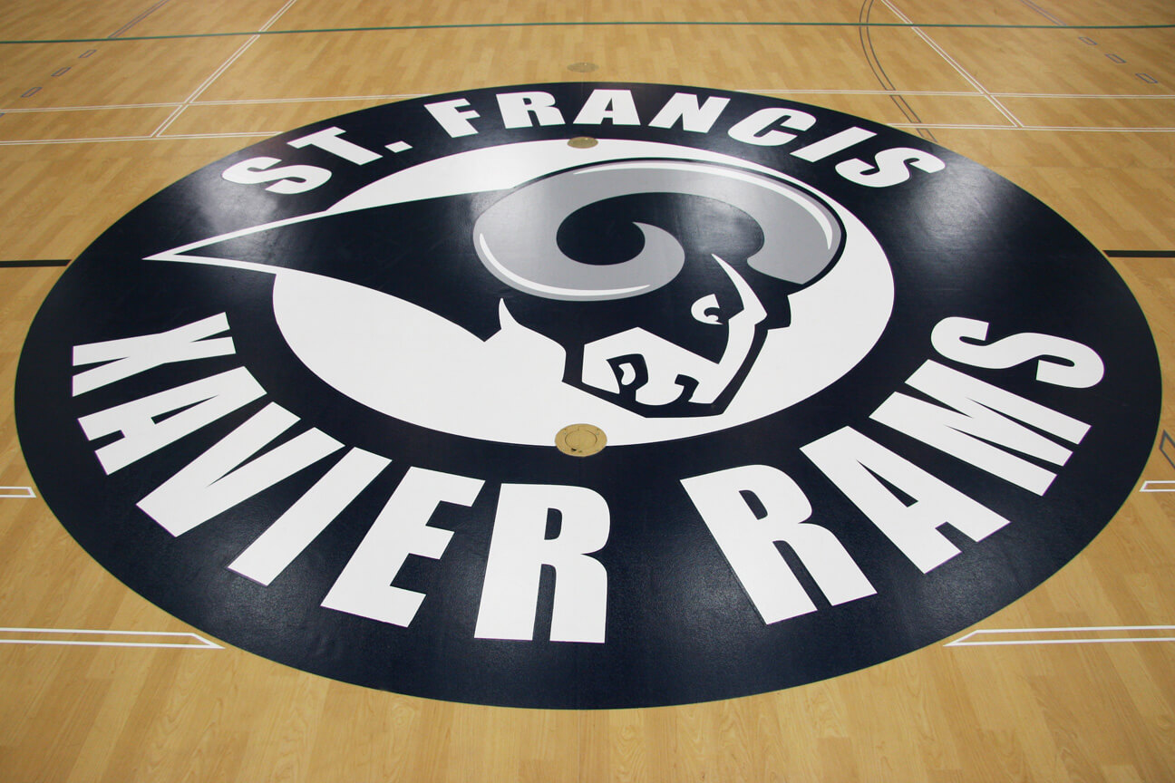 Central logo with specialised game line paint at St. Francis Xavier High School (Edmonton, Alberta)