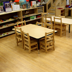 Kindergarten classroom with tables and chairs