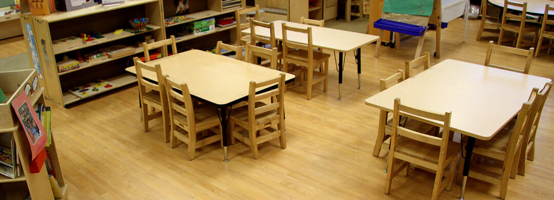 Kindergarten or daycare classroom with woodgrain vinyl flooring