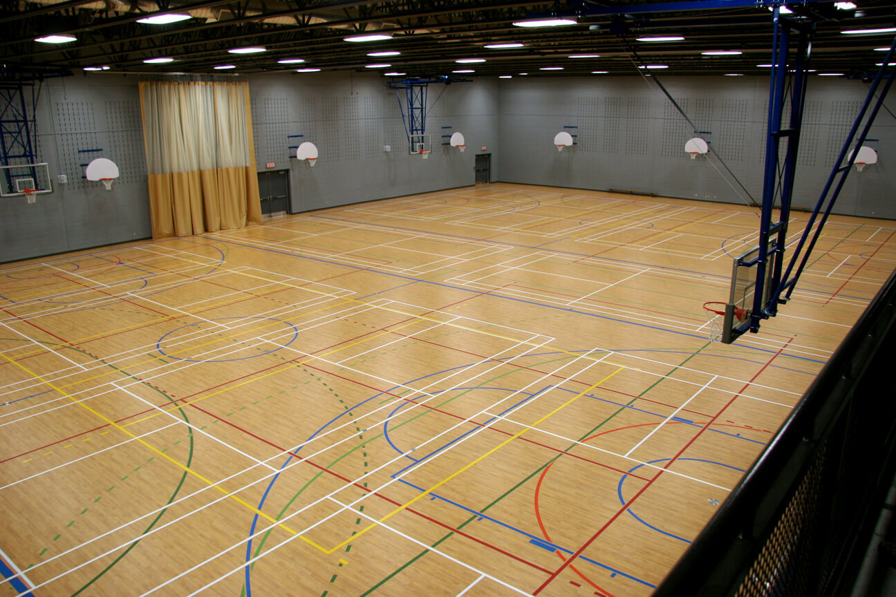 Game line markings in large gymnasium