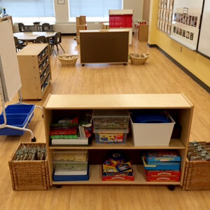 Furniture for storage in a kindergarten classroom on vinyl flooring