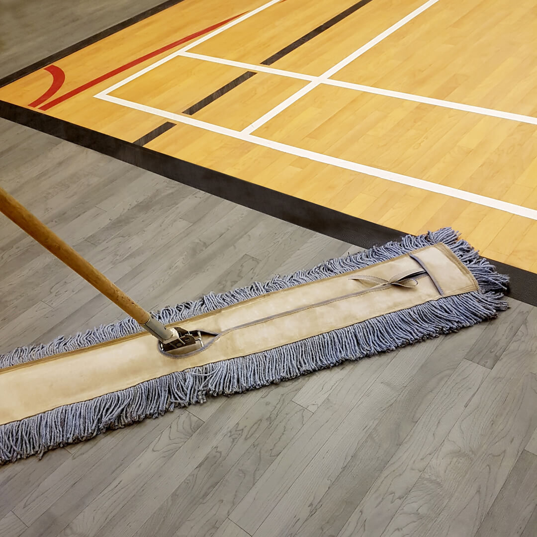 Microfiber broom sweeping gymnasium floor