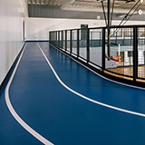 Running track with MultiFlex 2 synthetic flooring in a community centre