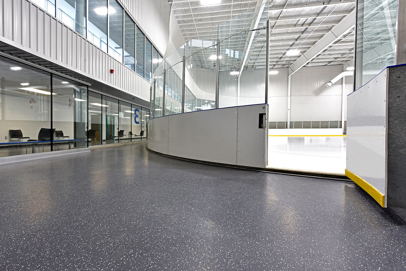 MaxFlor+ skate resistant flooring at rink access in arena (Oakville, Ontario)