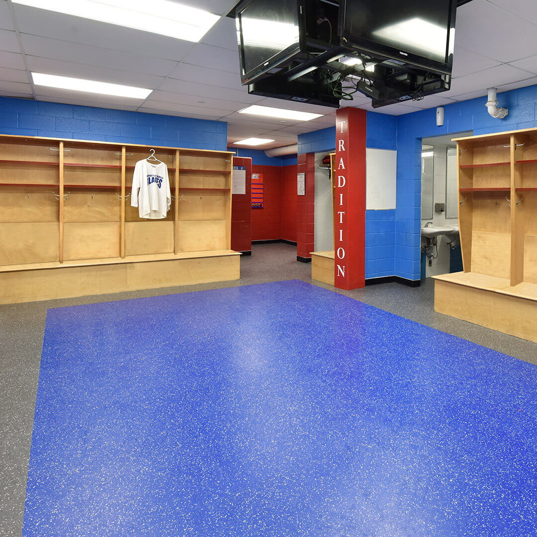 Player's change room with skate blade resistant rubber flooring