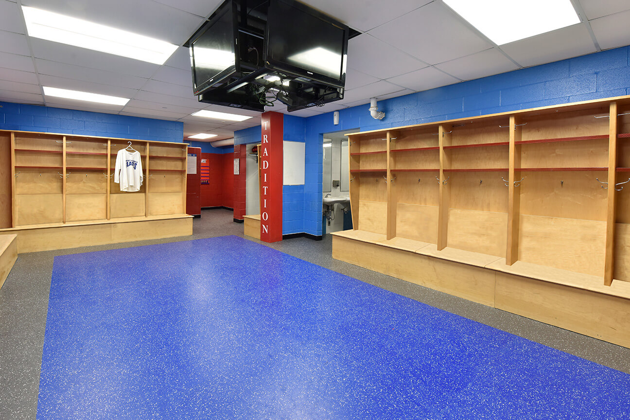 Changing room with rubber floors for hockey players in Royal Blue and Charcoal colours (Oakville, Ontario)