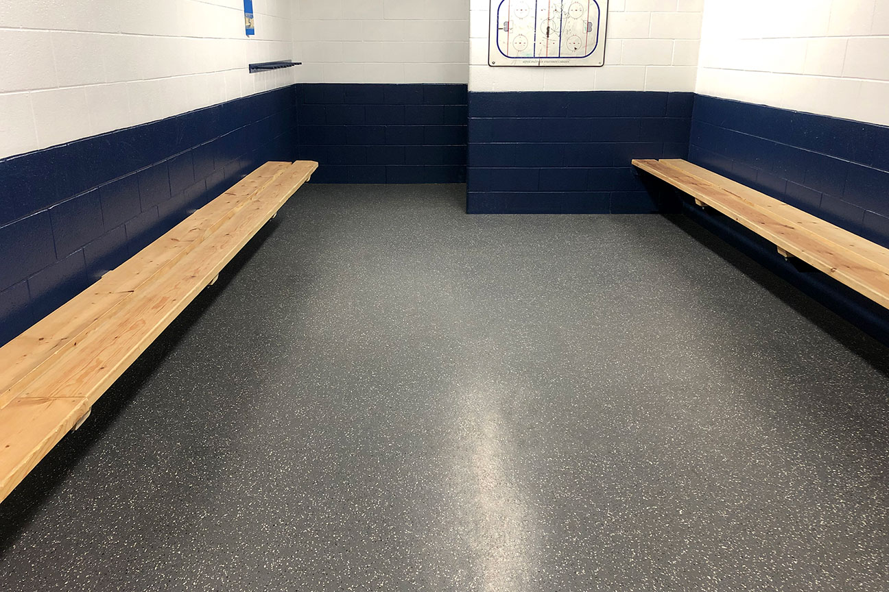 Rubber skate-resistant flooring in player change room (Strathroy, Ontario)