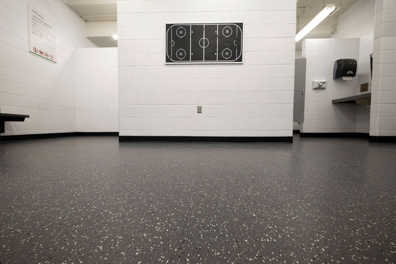 Rubber skate-resistant flooring in arena change room (Richmond Hill, Ontario)