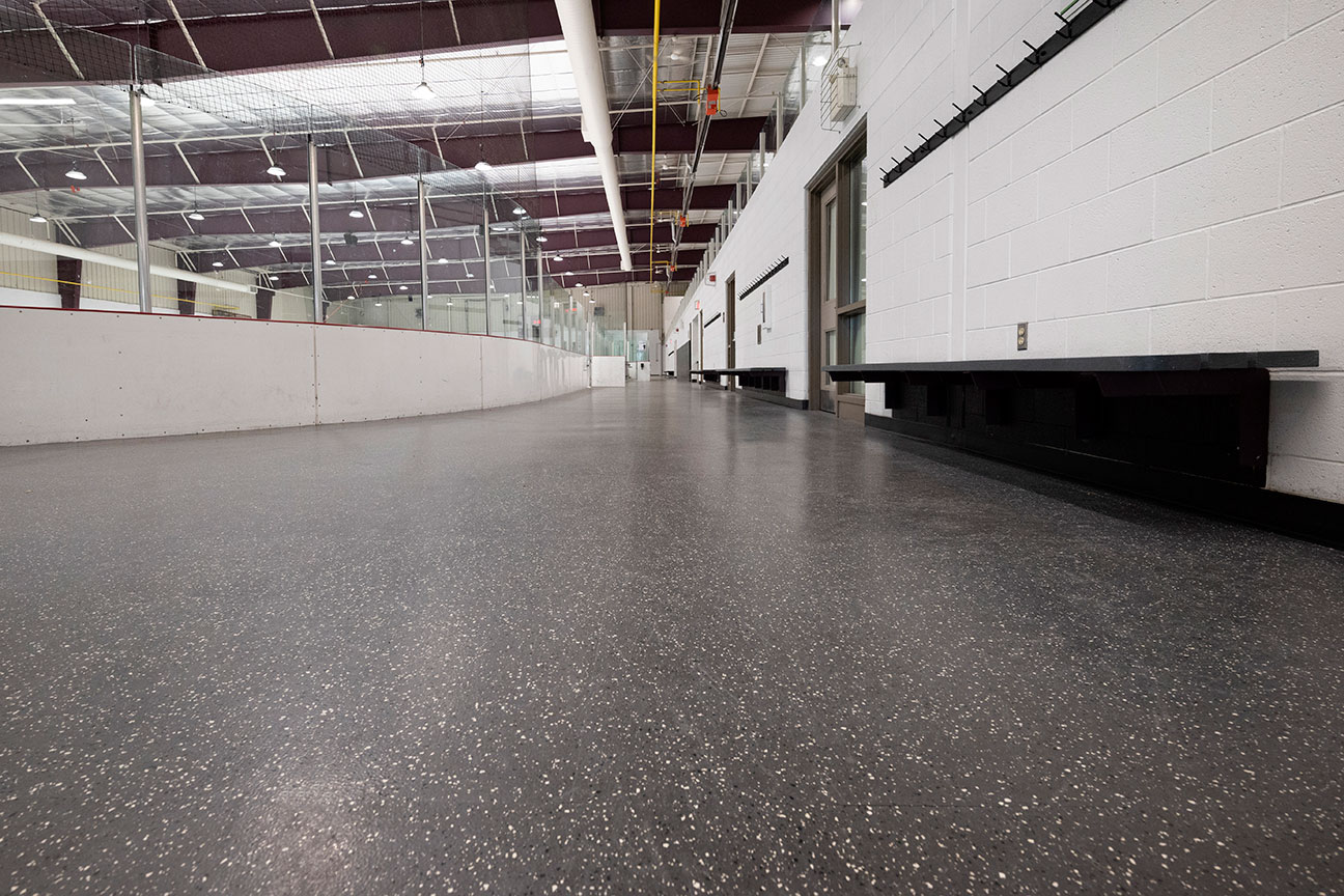 Rubber skate-resistant flooring in ice rink perimeter (Richmond Hill, Ontario)