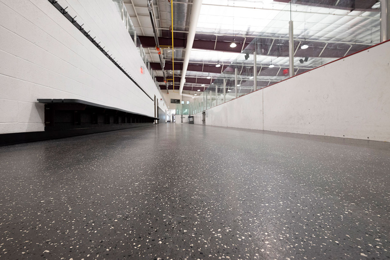 Rubber skate-resistant flooring used throughout the rink perimeter (Richmond Hill, Ontario)