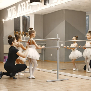 Ballet class four young girls in a dance studio