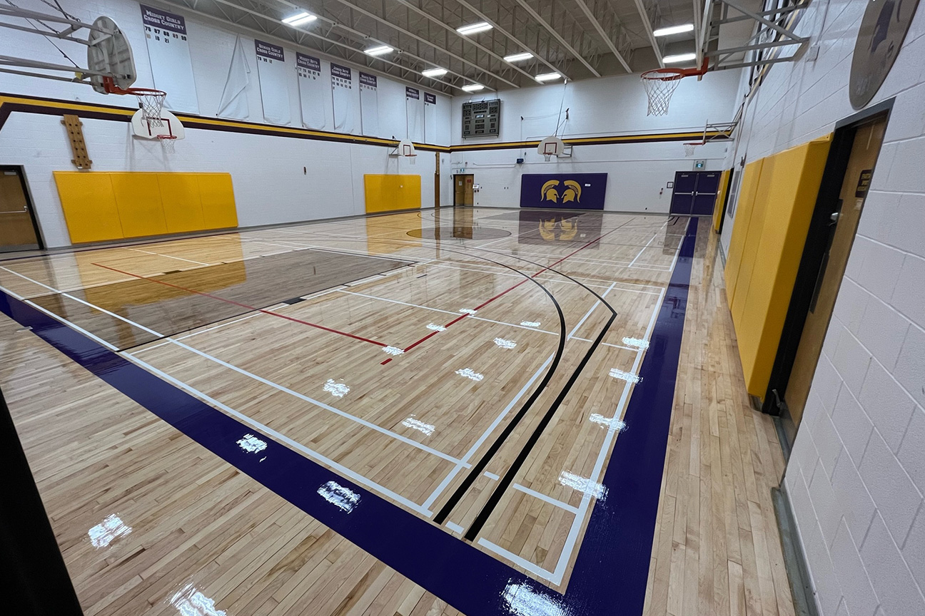 Refinished hardwood gymnasium at Centennial Collegiate Vocational Institute (Toronto, Ontario)