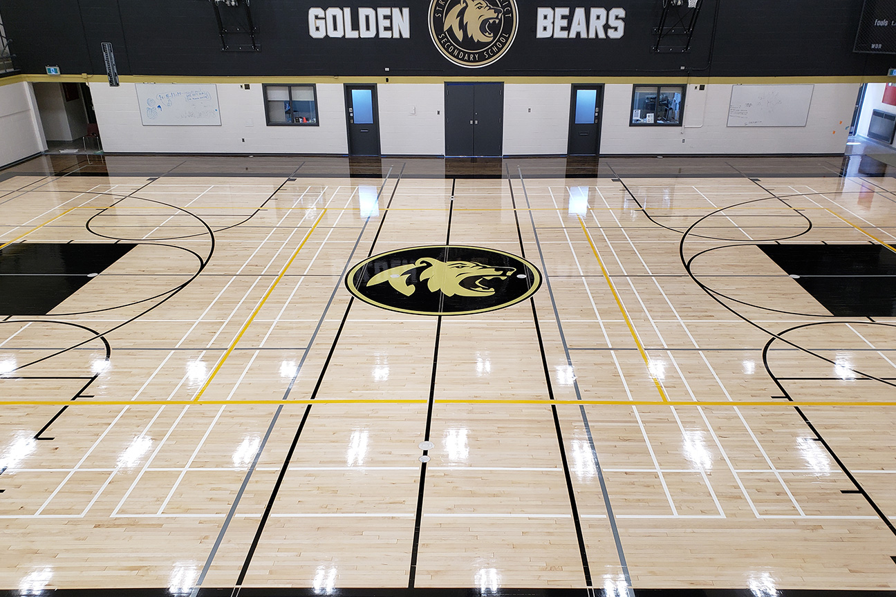 Hardwood refinishing project in the gymnasium at Stratford District Secondary School (Stratford, Ontario)