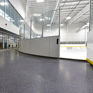 MaxFlor+ skate blade resistant surface around the access door to the rink