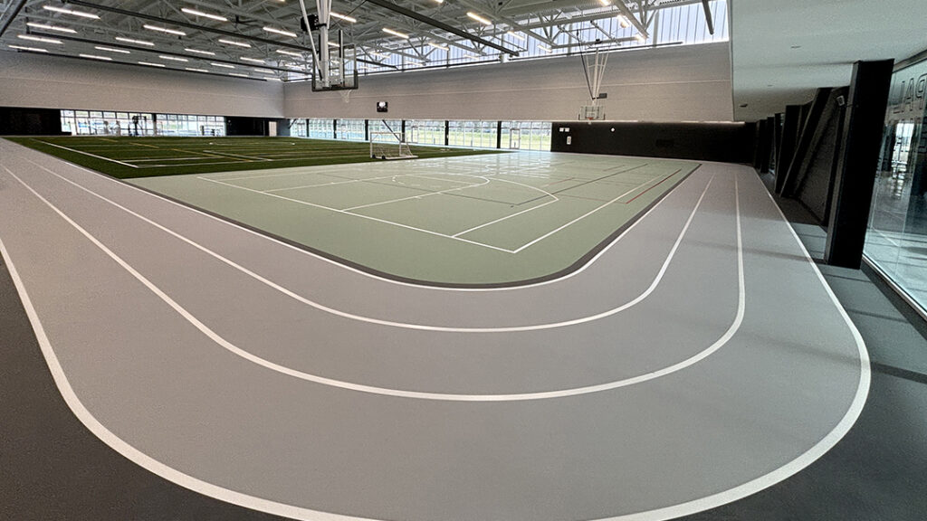 Zancor Recreation Centre with a gym and track with a PolyTurf Plus pad and pour sports flooring system