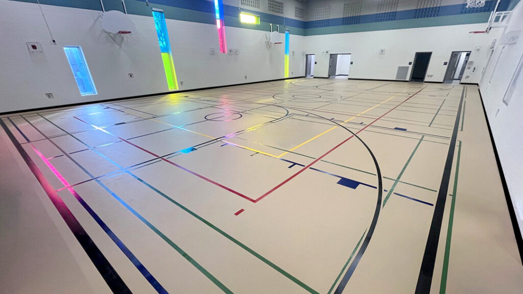 Dennis Avenue Community School with PolyTurf Plus pad and pour sports flooring system